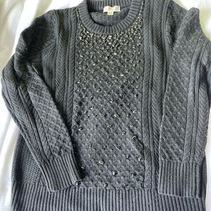 Black Michael Kors sweater.